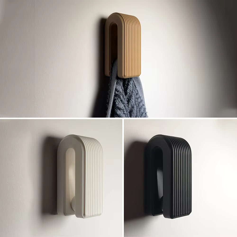 Selbstverriegelnder wandmontierter Handtuchhalter mit Schwerkraftmechanismus