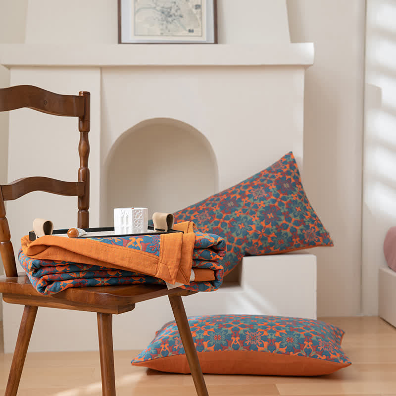 Ethniquilt - Baumwollquilt mit orange-blauem Muster in sechs Lagen