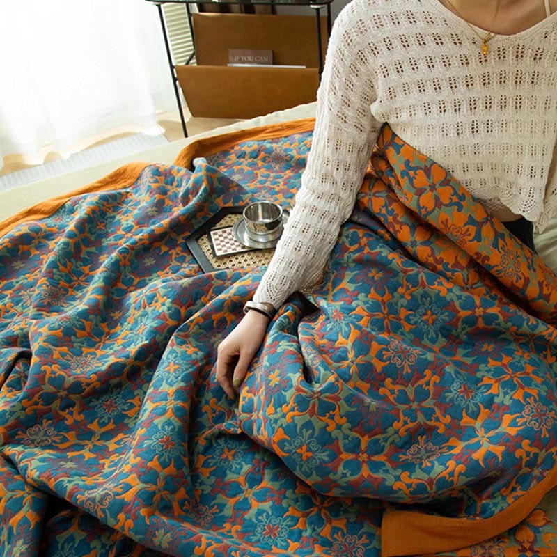 Ethniquilt - Baumwollquilt mit orange-blauem Muster in sechs Lagen