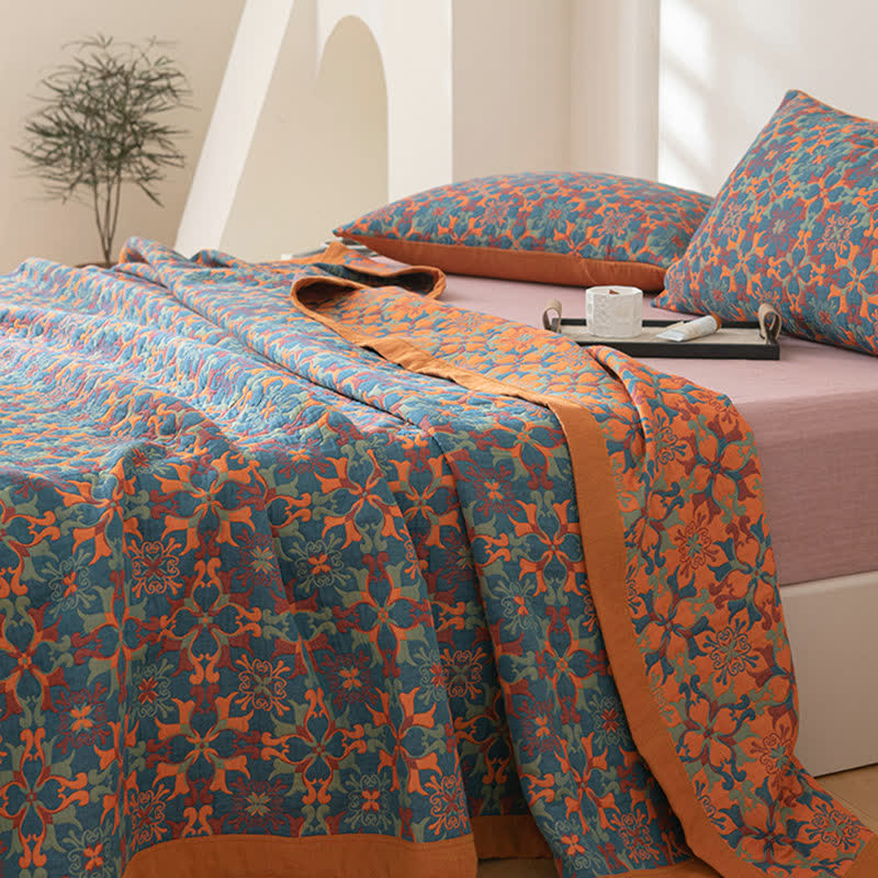 Ethniquilt - Baumwollquilt mit orange-blauem Muster in sechs Lagen