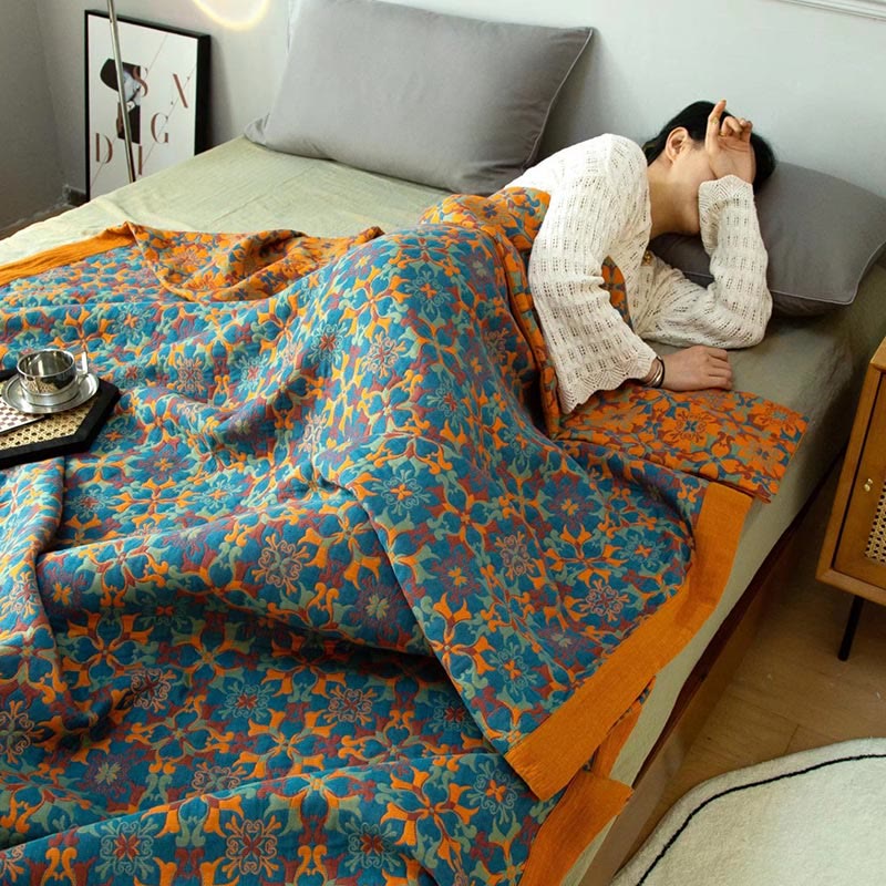 Ethniquilt - Baumwollquilt mit orange-blauem Muster in sechs Lagen