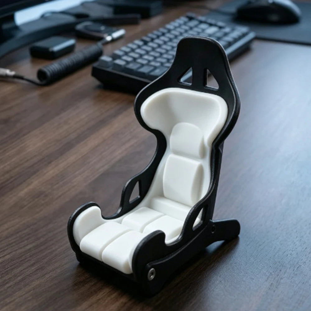 Handyhalter im Rennsitzdesign und Schreibtischdekoration