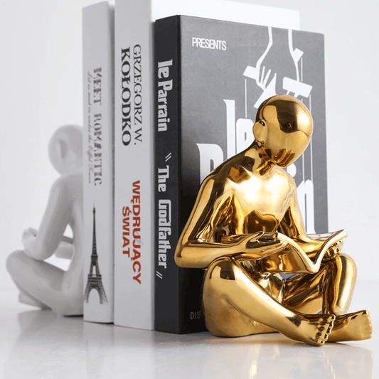 BookNest - Skandinavische kreative lesende Mann Skulptur Buchstütze